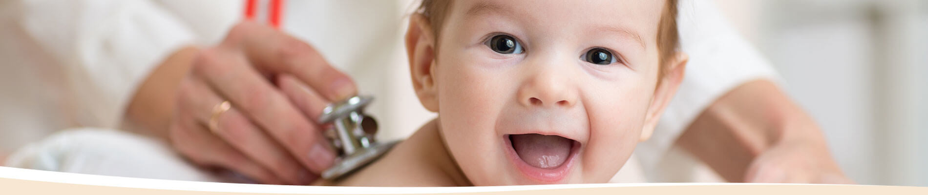 doctor examining baby